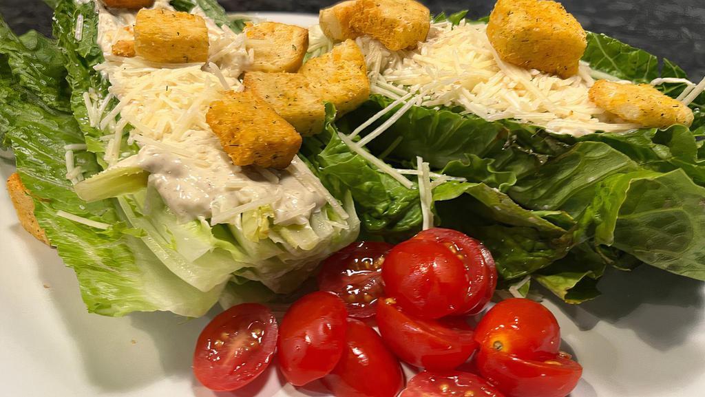 Caesar · Vegetarian. Topped with Croutons.