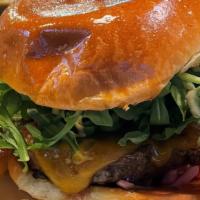 Red Bird Burger · 7 oz. Angus Burger, Cheddar Cheese, Tomato-Bacon Jam, Arugula, Pickled Onions, Bacon, Red Bi...