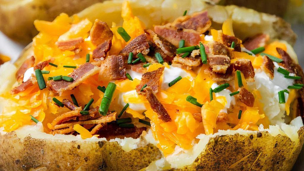 Loaded Baked Potato · Butter, sour cream, bacon, cheese, green onions