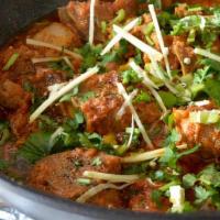 Chicken Karahi · Gluten free. Succulent and juicy meat cooked slow in a karahi or wok along with tomatoes, gi...