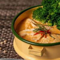 Panang Curry · Rich and creamy curry with kaffir lime leaves and crushed peanuts, steamed broccoli.