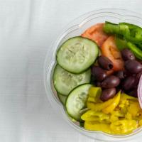 Garden Salad · Mixed lettuce, green pepper, tomato wedges, red onion, cucumbers, kalamata olives, pepperonc...