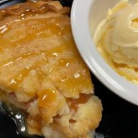 Apple Pie · Baked apple crisp served with vanilla ice cream.
