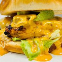 Chicken Chipotle Burger · Grilled chicken breast, American cheese, mushrooms, avocado, lettuce, tomato, and our secret...