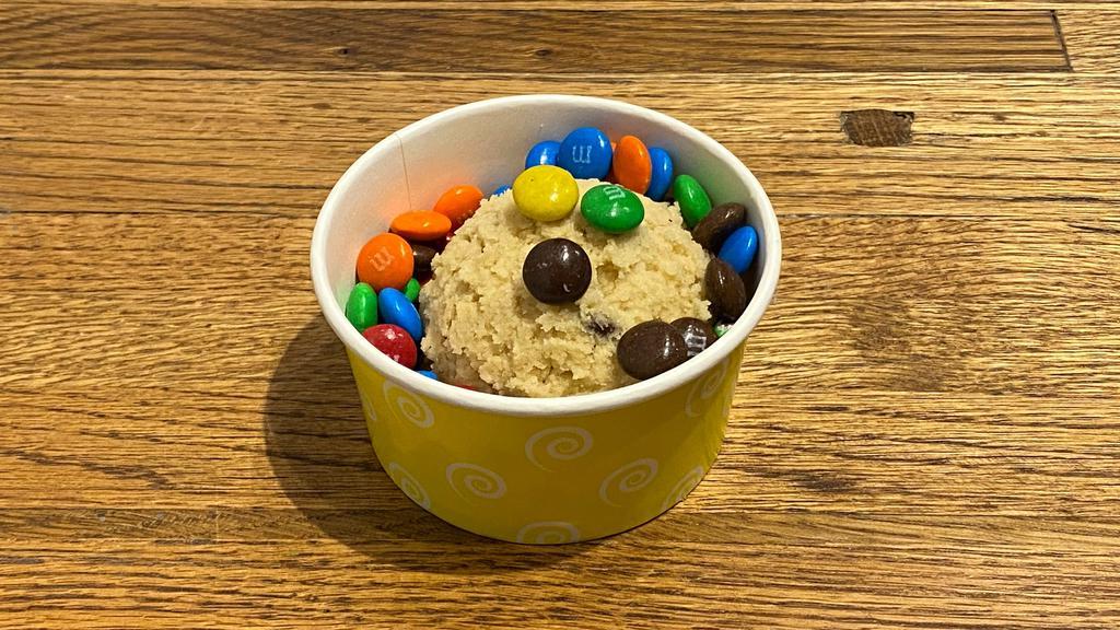 M&M Chocolate Chip Cookie Dough · Most popular M&M chocolate chip from scratch edible cookie dough served with melted chocolate on top.