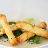 Chef’S Cigars    Nf · Lightly fried fill dough stuffed with feta cheese, dill, parsley, and scallion.