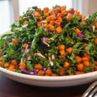 Kale Salad · Garden fresh kale tossed in granny smith vinaigrette, red onions and warm sweet potato crout...