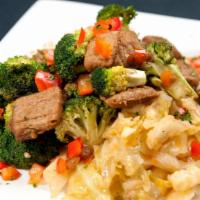 Beef And Broccoli (Vegan) · Sauteed vegan beef tips and broccoli. Served with rice and cabbage.