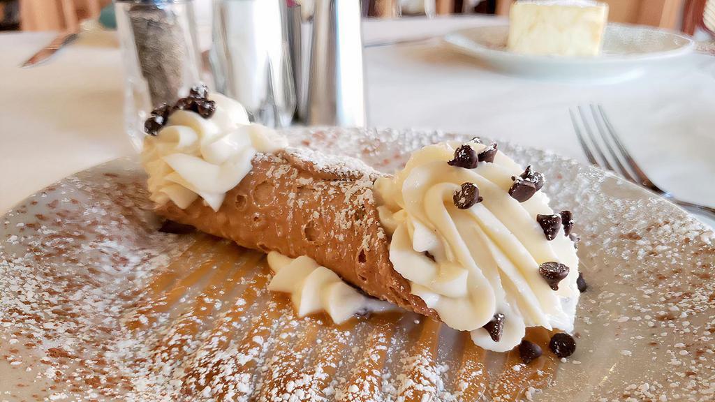 House Specialty Cannoli · These world famous tube-shaped Sicilian pastry desserts, are filled with sweet creamy Ricotta and delicious Chocolate Chips.