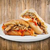 Chicken Philly Steak Sub · Our house special chicken philly with mayonnaise, lettuce, tomato, grilled onions, American,...