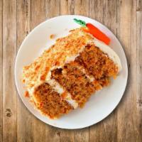 Carrot Cake · Perfect balance of cinnamon, nuts, pineapple smothered over the cream cheese frosting