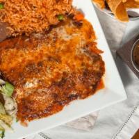 T-Mex Enchiladas · Served with rice and beans.