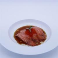 Yuzu Tuna · Seared tuna, mango served with yuzu ponzu, grape seed oil, and micro rainbow greens.
Consumi...