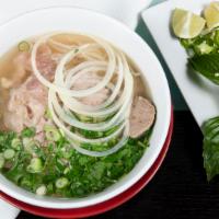 Pho One-O Special (Dac Biet) · Slices of rare eye round steak, brisk, soft tendon, tripe, and beef meatballs.