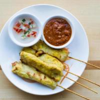Chicken Satay · (Gluten Free) Grilled marinated chicken, served with a peanut sauce & a sweet sauce