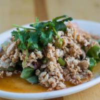 Larb Gai · Minced chicken seasoned in a spicy Thai dressing.