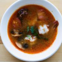 Tom Yum Soup · Spicy, chicken broth-based soup with mushrooms, tomatoes & shrimp