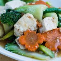 Sauteed Vegetables (V) · A stir fry of tofu with market vegetables — typically including broccoli, asparagus, carrots...