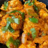 Chicken Tikka · Tender boneless chicken pieces of white meat marinated in yogurt, herbs and Indian spices, r...