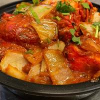 Tandoori Chicken · Spring half chicken marinated in yogurt and freshly ground Indian spices, roasted in tandoor...