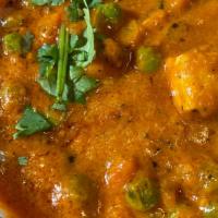 Mutter Paneer · Our flavorful blend of homemade cottage cheese and green peas, lightly seasoned with fresh h...