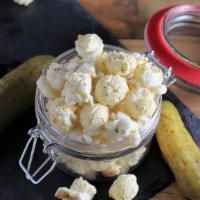 Dill Pickle · A tangy dill pickle flavor on our white cheddar popcorn. Our number one savory flavor.
