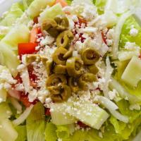 Greek Salad · Lettuce, tomato, cucumber, onion, black olives & feta cheese.