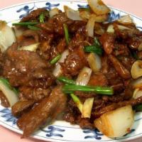 Mongolian Beef · (spicy) w. mushroom, onion, scallion. Served w.  white rice.