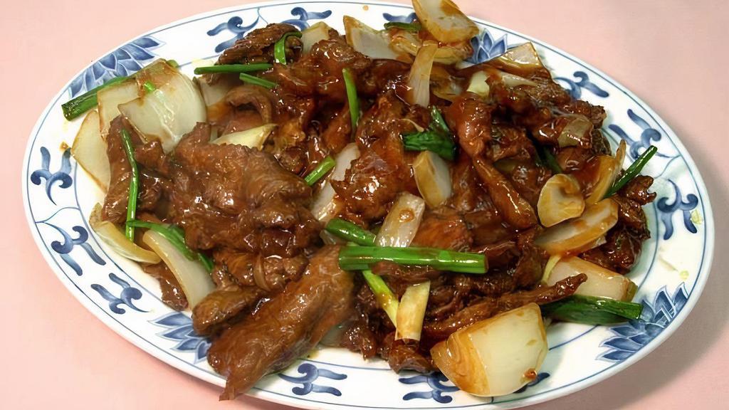 Mongolian Beef · (spicy) w. mushroom, onion, scallion. Served w.  white rice.