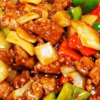 Szechuan Beef · (spicy) w. green & red pepper, mushroom, baby corn, snow pea, water chestnut. Served w.  whi...