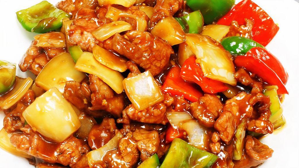 Szechuan Beef · (spicy) w. green & red pepper, mushroom, baby corn, snow pea, water chestnut. Served w.  white rice.