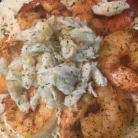 Shrimp Alfredo Pasta · Grilled shrimp topped with Alfredo sauce.