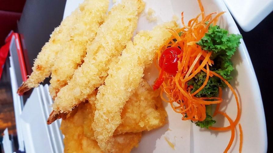 Vegetable Tempura · Crispy batter-fried assorted vegetables with tempura sauce.
