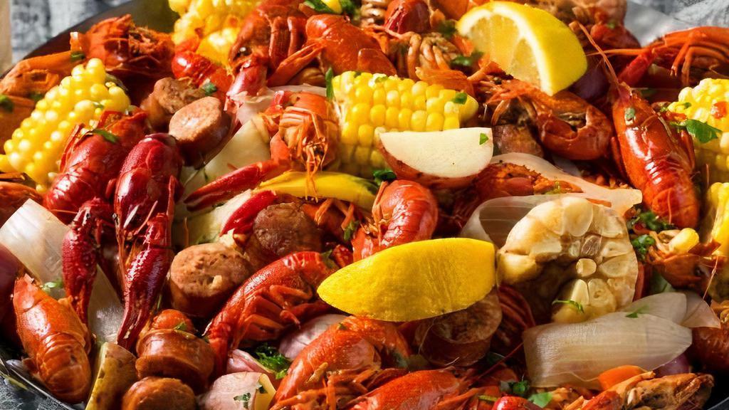 Combo 1 · ½ LB EACH OF SHRIMP HEAD OFF, BLK MUSSELS AND CRAWFISH COMES WITH CORN ON THE COB (1) & POTATO (1)