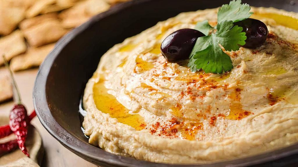 Hummus · Dip made from chickpeas. Served with Pita Bread