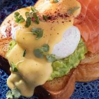 Benedict Egg With Salmon · brioche, guacamole, salmon, poached egg, hollandaise sause, microgreens.