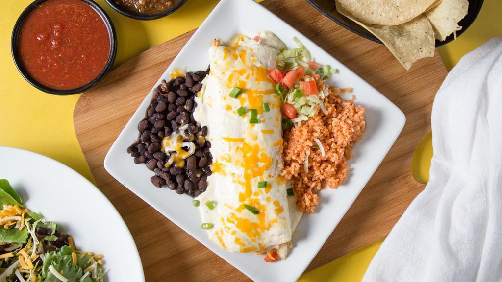 Cream Cheese Burrito · Beef, chicken, or pork, pico, cheese (served with black beans and rice).