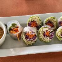 Fresh Summer Rolls · Fresh thin sliced carrots, red and white cabbage, fresh mint, tofu, and vermicelli, rolled i...