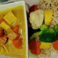 Golden Curry Vegetables · Potatoes, carrots, sweet potatoes, and tofu infused in our signature curry sauce served with...