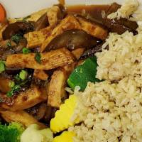 Eggplant With Basil · Asian eggplant with tofu and basil in a mild spicy garlic brown sauce.