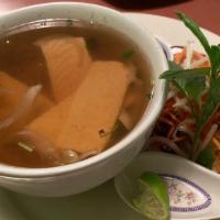 Vietnamese Sweet & Sour Soup · Traditional home cooking. Pineapple, tomato, celery, bean sprouts, mushroom and tofu, simmer...
