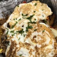 Marco Pollo · Shredded Adobo Chicken, Jalapeno, Bell corn, Pepperjack, potatoes