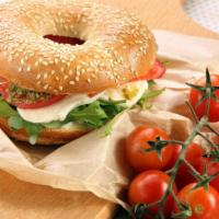 Bagel With Tomato & Pesto · Exquisite sandwich with tomato and pesto on customer's choice of bagel.