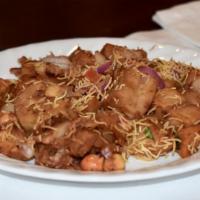 Tangy Aloo Chat Salad · Shallow fried potatoes tossed with chopped cucumber, onions, tomatoes, chutney and sprinkled...