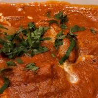 Chicken Tikka Masala · Prepared with diced peppers, onions and tomatoes cooked in yogurt, cashew paste, cream and f...