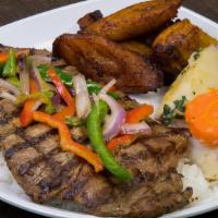 Carne Asada · tender steak with green peppers, red peppers and onions served with two sides