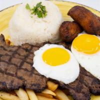 Bistec A Lo Pobre · tender steak with fried plantains, fried eggs served over fries and white rice
(No Substitut...