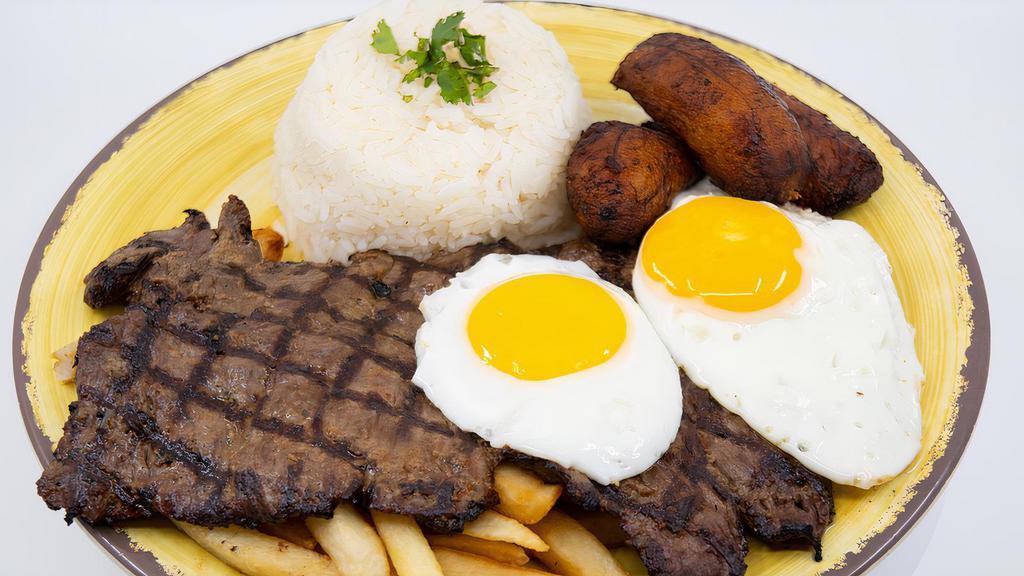 Bistec A Lo Pobre · tender steak with fried plantains, fried eggs served over fries and white rice
(No Substitutions)