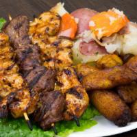 Mixed Kabob · one chicken, one steak and one shrimp skewer served with two sides