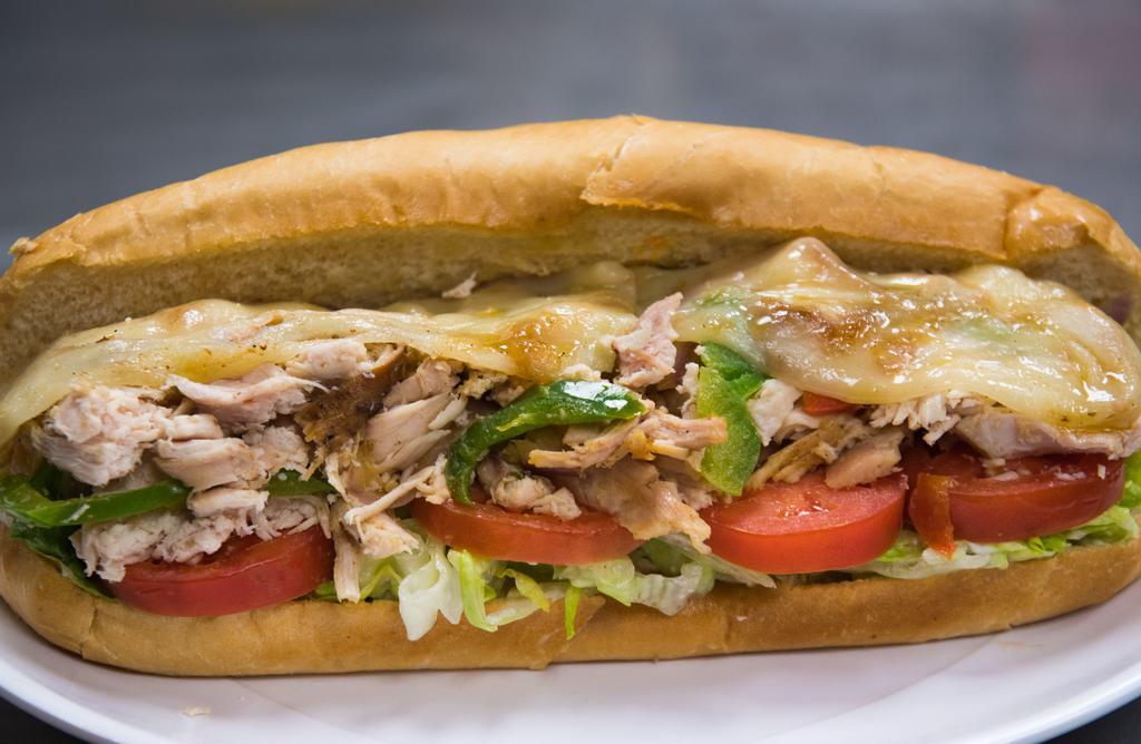 Charbroiled Chicken Sub · chopped charbroiled chicken with onions, red peppers, green peppers, provolone cheese, lettuce, tomatoes and mayonnaise